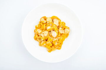 A plate of fresh scallop meat