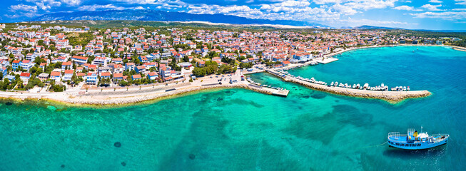 Town of Novalja beach and waterfront on Pag island aerial panoramic view