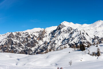 Fototapeta na wymiar Mountain range of Monte Carega in winter with snow, called the small Dolomites and the Altopiano della Lessinia (Lessinia High Plateau). Veneto and Trentino Alto Adige, Italy, Europe.