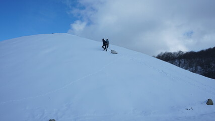 skier on the top of the mountain