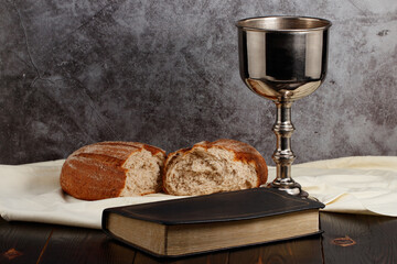holy communion chalice with wine and bread