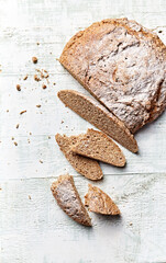 Homemade wholegrain wheat bread with oat flakes. Healthy food concept - 416087146