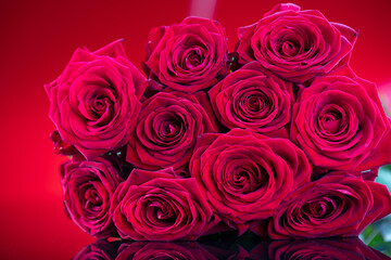 Fototapeta na wymiar Bunch of roses on the bokeh background. Women’s day gift. 