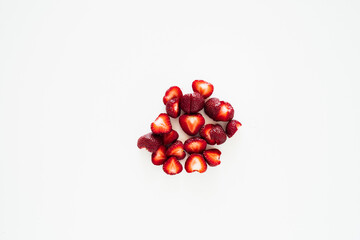 handful of sliced strawberries on white background. High quality photo
