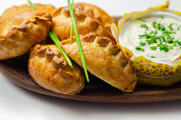 Mini pasties with sour cream, succulent pork, turkey, bacon and cranberry all wrapped in shortcrust pastry