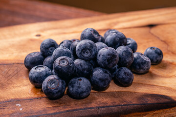 blueberries on wooden background