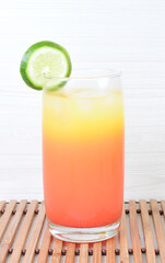 Colorful drinks, Italian sodas with ice, fruit flavors on white wooden background