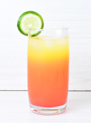Colorful drinks, Italian sodas with ice, fruit flavors on white wooden background