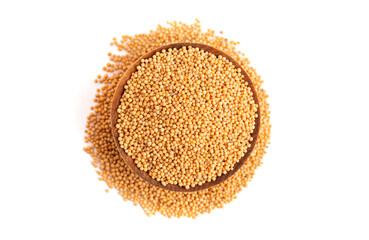 Bowl of Mustard Seeds Isolated on a White Background