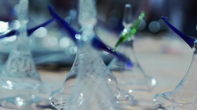 whirling dervishes made of glass. whirling dervishes made of glass rotating in the gift shop.