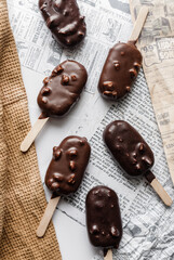 chocolate ice cream on newspaper