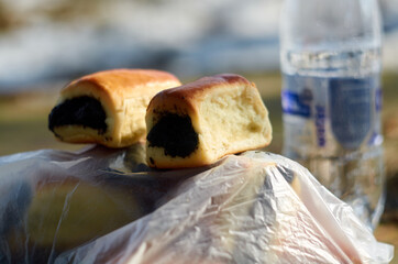 Two small buns with poppy seeds