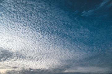Blue sky with white spring clouds