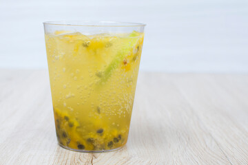 italian flavored sodas with ice and tropical flavors on white wooden background