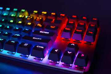 Mechanical gaming keyboard with backlight, close-up. Gaming keyboard with RGB backlight. RGB LED...