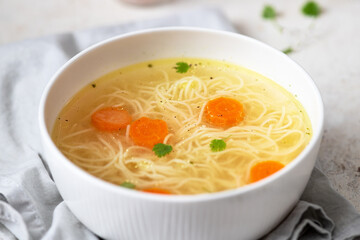 Homemade chicken soup with noodles and vegetable