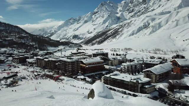 Panorama of Cervinia ski resort, Italy. Beautiful landscape in the Italian Alps. Ski slopes with lifts and skiers