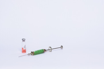 photo syringe covid vaccine on white background