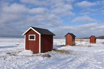 Red small fishing cabins