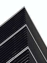 Fototapeta na wymiar Black and white detail with a modern office building. Abstract photography