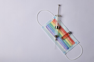 LGBT flag syringe and virus vaccine will save the world
