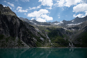 Naklejka na ściany i meble Beautiful mountain lake Gelmersee in Bern Switzerland