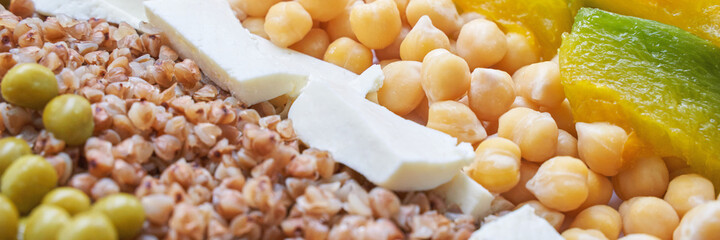 Food bowl with chickpeaks. Health dinner. Vegetarian cooking cuisine. Cafe organic meal. Fresh lunch with pumpkin and feta cheese. Detox spicy. Above view. Flatlay. Closeup. Banner