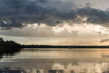 Sunset at Cuieiras river in the Brazilian part of the Amazon Jungle