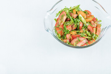 A glass plate of delicious vegetable salad