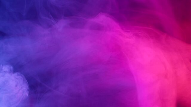 Color smoke on dark background