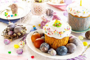 Festive Easter table with colored eggs, Orthodox bread and cottage cheese Easter.