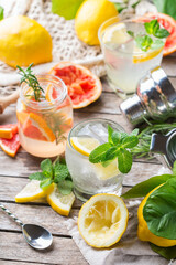Hard seltzer cocktails with citrus fruits, zero waste bartenders accessories