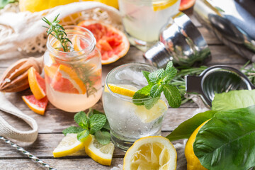 Hard seltzer cocktails with citrus fruits, zero waste bartenders accessories