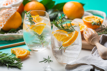 Hard seltzer cocktail with orange and zero waste bartenders accessories