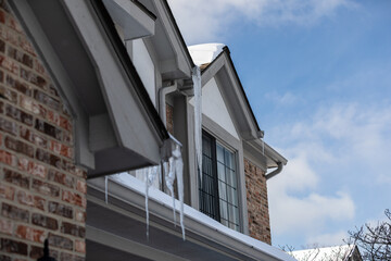 Ice Sickle Damming on Roof