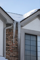 Ice Sickle Damming on Roof