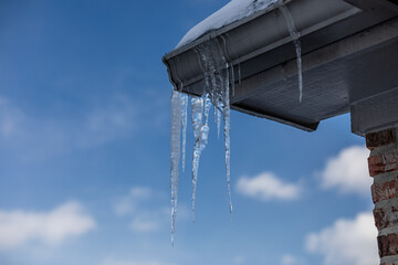 Ice Sickle Damming on Roof