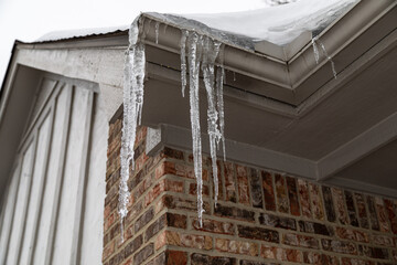 Ice Sickle Damming on Roof