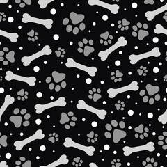 Fototapeta na wymiar Seamless pattern paw print and bone. Black white background. Vector Illustration