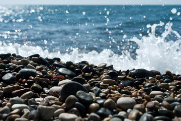 Beach stones and sea wave 