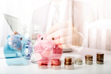 businesswoman holding coins putting in glass with using smartphone and calculator to calculate concept saving money for finance accounting