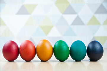 Colorful easter eggs on light background