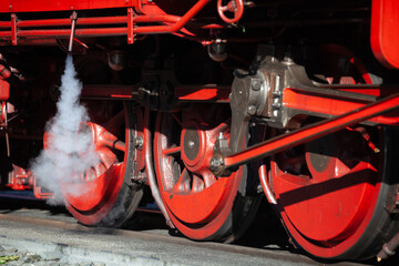 Red steam railway wheels