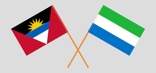 Crossed flags of Antigua and Barbuda and Sierra Leone. Official colors. Correct proportion