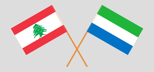 Crossed flags of the Lebanon and Sierra Leone. Official colors. Correct proportion
