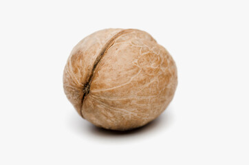 Authentic california walnut akhrot in shell isolated on white background