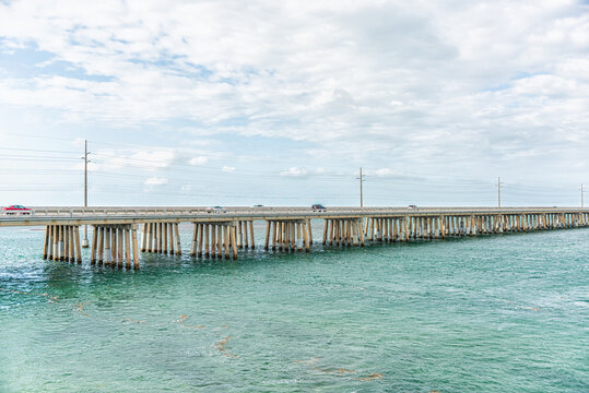 Seven Mile Bridge landscape of Florida Keys water of Atlantic ocean with cars on Overseas Highway road in summer