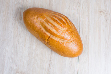 Fresh bakery on light wooden background