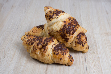 Fresh bakery on light wooden background