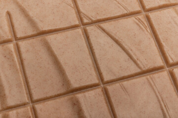 Milk chocolate bar. Chocolate texture close-up. Chocolate seamless background.